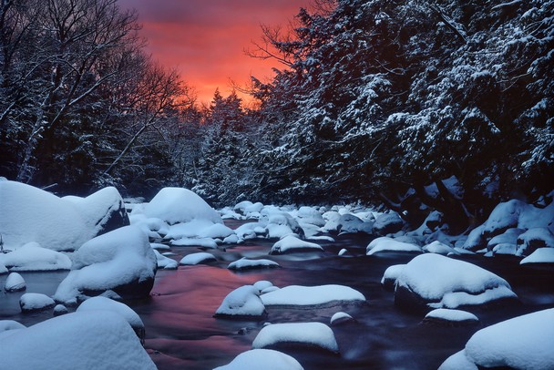 Sunset on a snow covered river